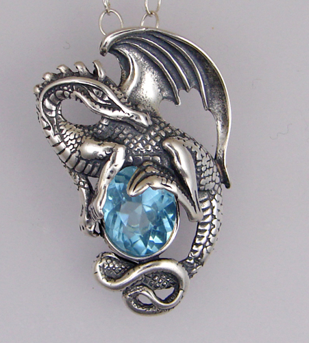 Sterling Silver Dragon of Power Pendant With Blue Topaz